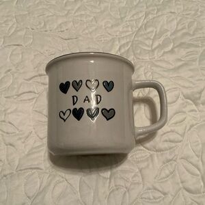 Boston Warehouse white mug with debossed imprint on both sides